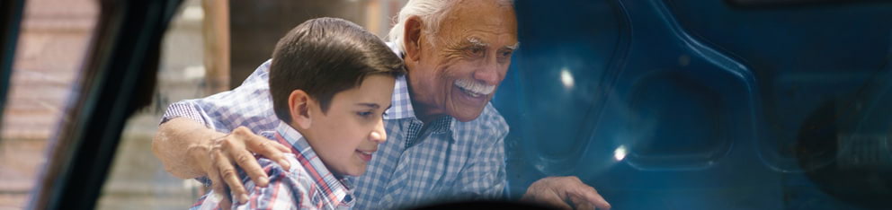 Man and child smiling