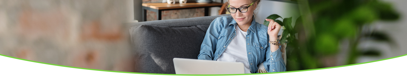 Woman looking at laptop