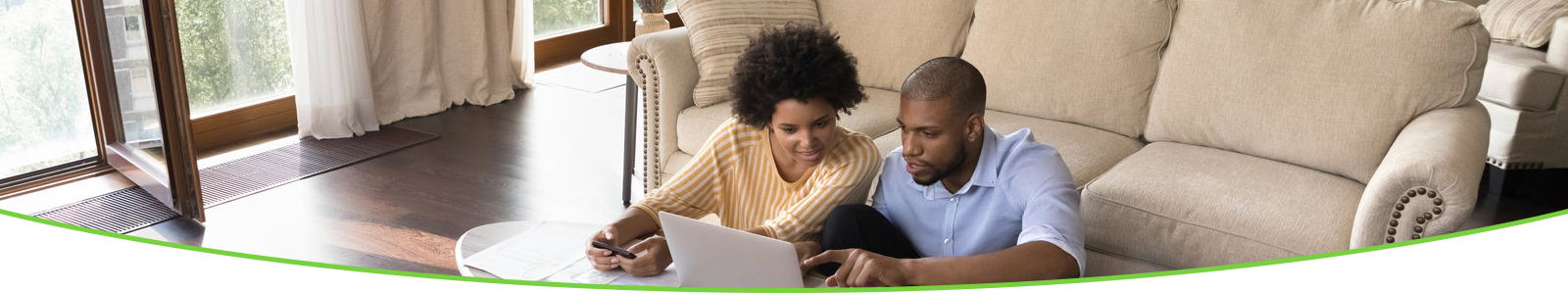 Couple looking at laptop