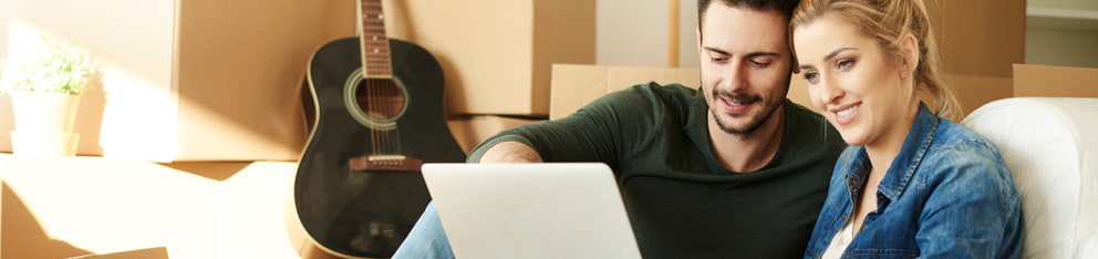 Couple looking at laptop