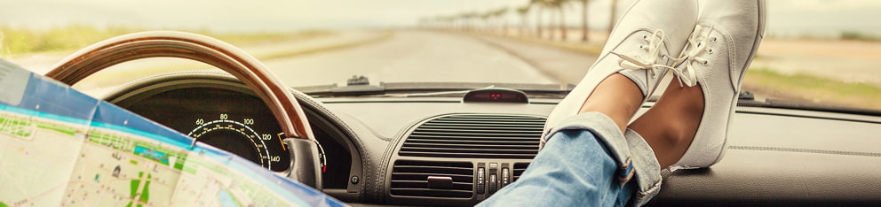 Feet on a dashboard