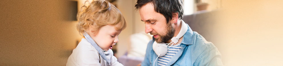 Man and child smiling