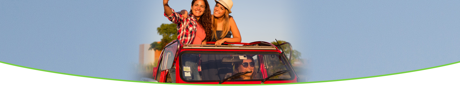 Women standing in a car